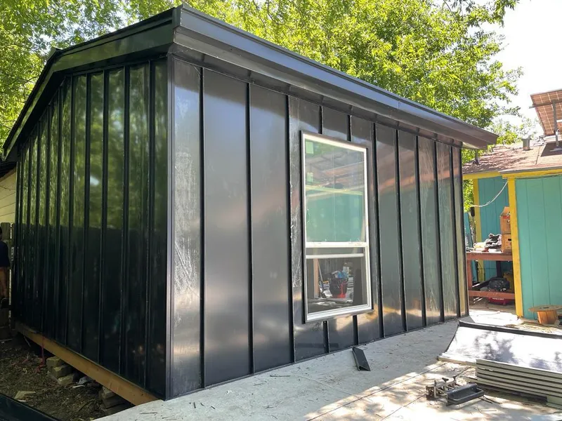 Black standing seam metal wall panels for Roof Inspection in Carneys Point